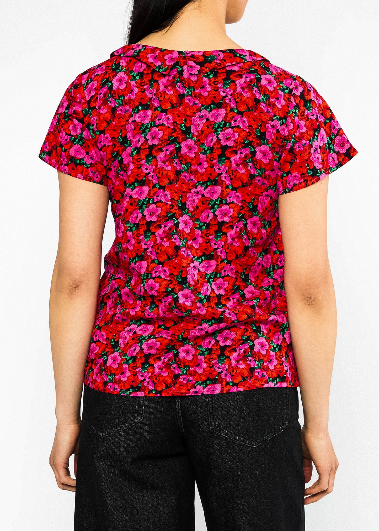 Summer blouse Feed the Birds bed of primroses